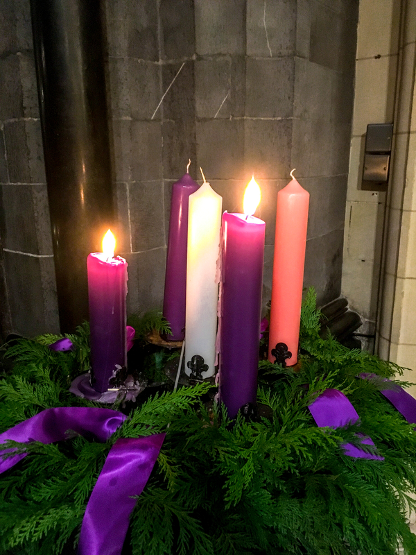 White and Purple Candles in a Church